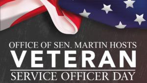An American flag over a gray background with the words “Office of Sen. Martin Hosts Veteran Service Officer Day” in white lettering